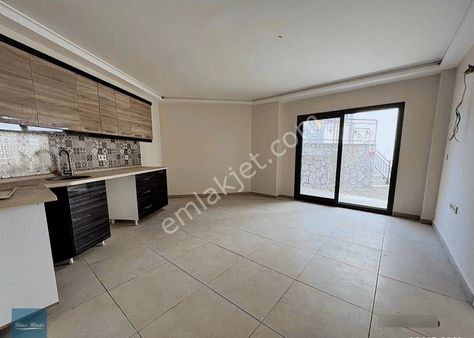 *kuşadası Garaj Arkasında 1+1 Masrafsız Daire