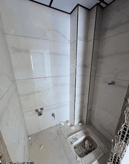 Kumlubel Mh. Zeminden Isıtmalı Ebeveyn Banyolu Satılık 2+1 Daire