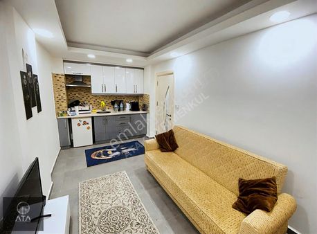 Ata'dan Siteler'de Denize 50 Mt Düzgün Eşyalı Ara Kat 1+1 Daire