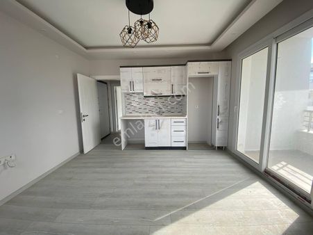 Didimde Satılık Asansörlü Binada Ön Cephe 1+1 Daire