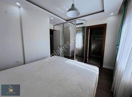 12.cadde//eşyalı//kiralık//2+1//otopark//doğalgaz//şömine//