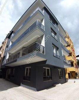 İzmir Karabağlar//bozyaka,ssk'ya 10dkmesafede.//sıfır Asansörlü//otparklı//90m2 Arakat//2+1 Daireler