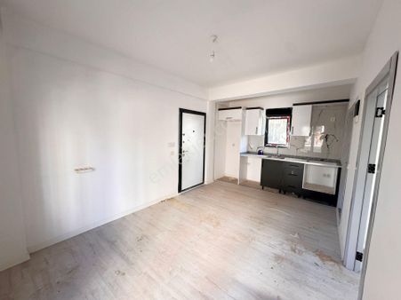 Güneş Mahallesinde 1+1 Sıfır Satılık Daire