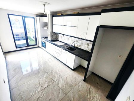 Burhaniye Bahçelievler'de Aygülden Arakat Ön Cephe Ayrı Mutfak Doğalgazlı Asansörlü 2+1satılık Daire