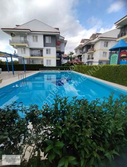 Dalaman Merkezi Konumda Havuzlu Sitede Satılık Eşyalı 2+1 Daire