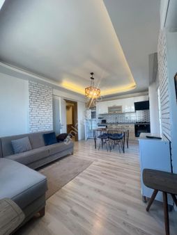 Kuşadası Davutlar’da 2 + 1 Lüks Daire Satılık