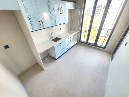 Burhaniye Bademalanın'da Aygülden Sıfır Ara Kat Ön Cephe Ayrı Mutfak Doğalgazlı 2+1 Satılık Daireler