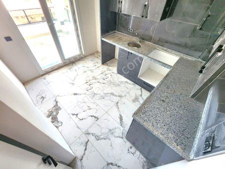 👉burhaniye'de Aygül'den Yerden Isıtmalı Asansörlü Kat Ve Cephe Seçenekleri İle 2+1 Satılık Daireler