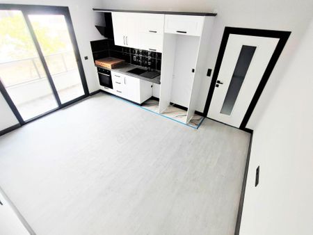 Akçay'da Aygül'den Sıfır Denize Çok Yakın Ara Kat Ön Cephe Kat Cephe Seçenekli 1+1 Satılık Daireler