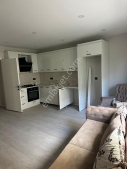 Davutlar'da Merkezde Sıfır 1+1 Satılık Daire