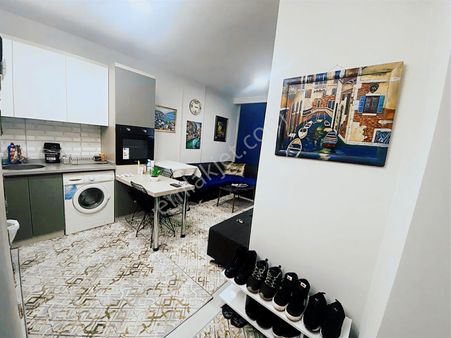 Güneş Mahallesi'nde 1+1 Havuzlı Güvenlikli Satılık Daire