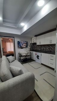 Asmalıevlerde Merkezi Konumda Sıfır Arakat Eşyalı Balkonlu 1+1