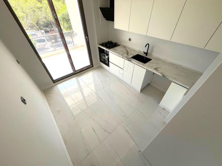 Aygül'den Edremit Zeytinli'de Muhteşem Doğa Manzaralı Sıfır Çift Cephe Ayrı Mutfak 2+1 Satılık Daire