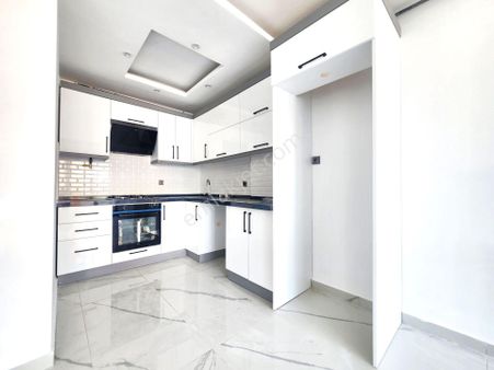 👉burhaniye Ören'de Nezih Site İçi Havuzlu Güvenlikli Ara Kat Doğalgazlı Asansörlü 1+1 Satılık Daire