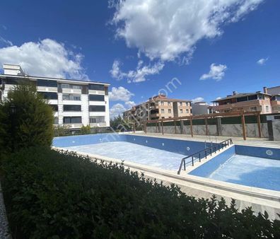 Karaca'dan Kumbağ Mah.havuzlu Site İçerisinde Kiralık 1+1 Daire