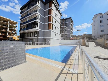 Karaca'dan Atatürk Mah.'de Eşyalı, Havuzlu Kiralık 1+1 Daire