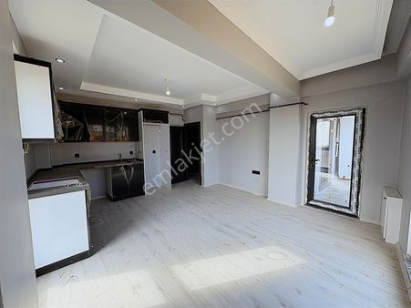 Karaca'dan Altınova Mah.'de Sıfır 1+1 Deniz Manzaralı Satılık