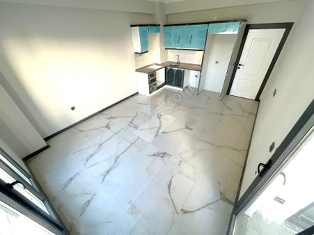 Kadıköy'de Aygül Farkı İle Sıfır Ara Kat Yerden Isıtma Doğalgazlı Kapalı Otoparklı 2+1 Satılık Daire