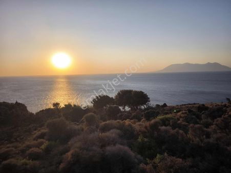 İmroz Emlak'tan Mesadi Mevkii'de 1.112 M2 Deniz Manzaralı Arazi