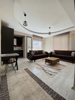 Afyon Özsu Emlak'tan Uydukentte Eşyalı Kiralık 1+1 Geniş Daire