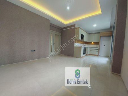 Denizden Akçayda Öncephe Kapalı Otoparklı Yerden Isıtmalı Satılık 2+1 Daire.