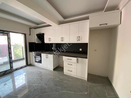 Türker Emlak | 2+1 100m2 Sıfır Bina Asansörlü Otoparklı Daire