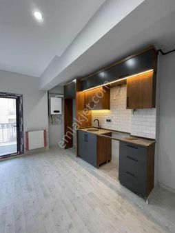 Türker Emlak I Hastane Karşısı 1+1 Sıfır , Asansör , Otopark