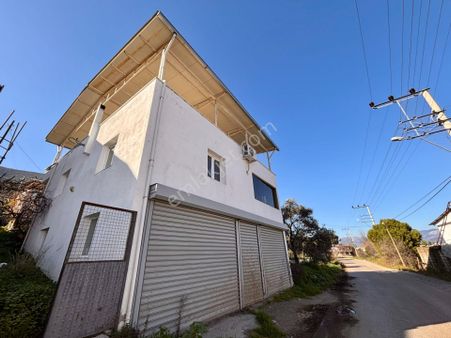 Muğla Milas Ovakışlacık’ta Ruhsatlı İki Ayrı Konut Bulunan 573 M² Arsa