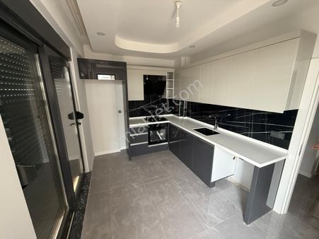 V.aydoğmuşta Sıfır Ebv Banyolu Çift Balkonlu Havuzlu İskanlı Kat Cephe Seçenekli 2+1 Ler