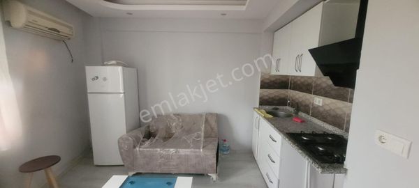 Alsancak Kahramanlar İzban Yakını Satılık Mobilyalı 1+1 Bahçeli