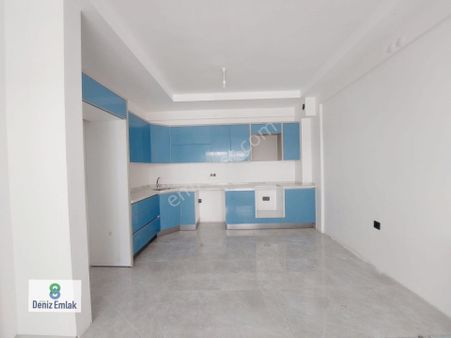 Denizden Akçayda Havuzlu Otoparklı Full Kredili Satılık 1+1 Daire.