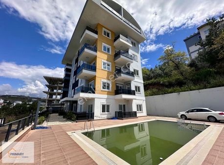Konaklı Mahallesi'nde Deniz Manzaralı Satılık 1+1 Daire