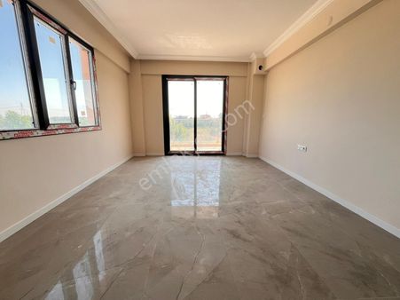 Akgedik Zeki Emlak'tan Manisa Akgedik Mahallesinde Site İçinde Satılık 2+1 Kapalı Mutfak Daire