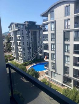 Pazarcı Mahallesinde Satılık Site İçerisinde 1+1 Eşyalı Daire