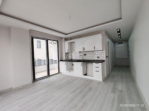 KÖRFEZDE DENİZ MANZARALI ULAŞIMA YAKIN KİRALIK 1+1 DAİRE