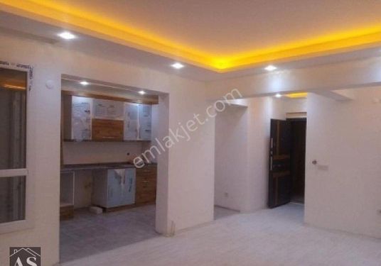 Kuşadası'nda 2+1 125 m2 deniz manzaralı araa kat satılık daire