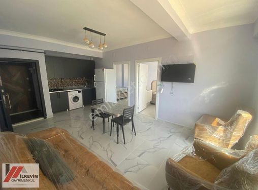 SIRRIN CADDE ÜZERİNDE EŞYALI KİRACILI SATILIK 2+1 DAİRE