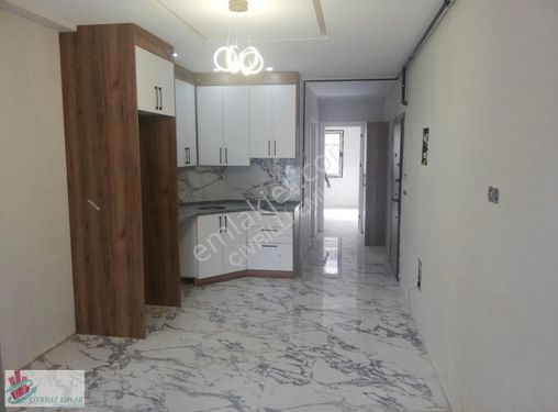 DENİZLİ ZEYTİNKÖYDE 1+1 ÇİFT CEPHE SIFIR APARTLARIMIZ SATILIKTIR