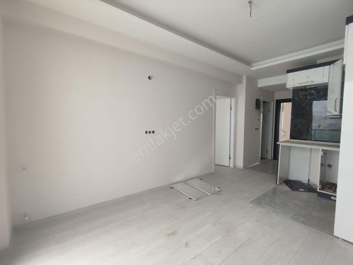  Bornova KIZILAY Mah. Merkezi Konum'da 1+1 Sıfır Satılık Daire