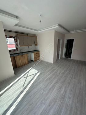 ERGÜNDEN ÇİFTLİKKÖYDE AZ KATLI YATIRIMLIK SATILIK 1+1 DAİRE