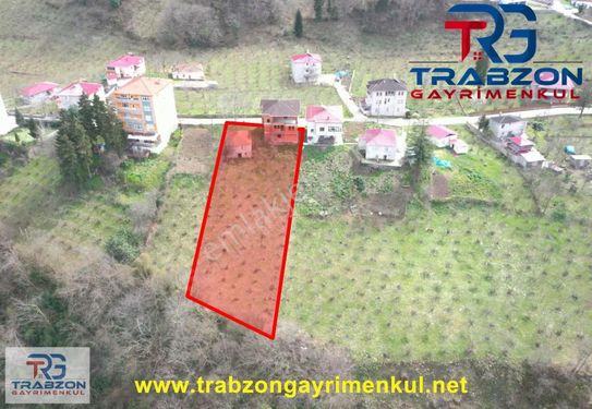 TRABZON GAYRİMENKULDEN DOLAYLIDA 1.5 DÖNÜM ARSA VE KARKAS BİNA