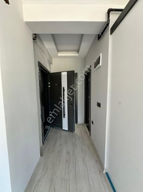 ATAKUM KÖRFEZDE SATILIK 1+1 ARA KAT DAİRE