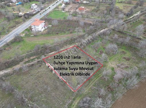 Korkuteli Bozovada 1250 m2 Sulu Bahçe Arazisi yol sorunu yok