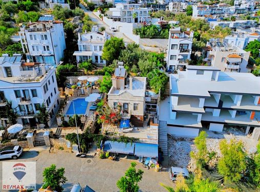 RE/MAX PUPA'DAN KALKAN'DA ANA CADDEDE SATILIK ÖZEL HAVUZLU DAİRE