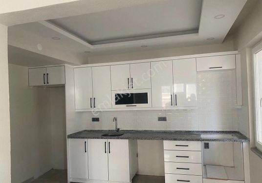 ATATÜRK MAHALLESİNDE SATILIK ZEMİN KAT 2+1 DAİRE