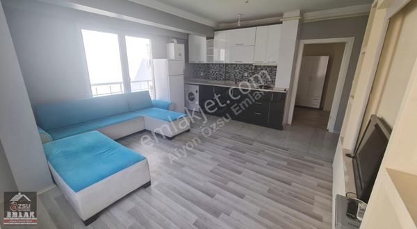 AFYON ÖZSU EMLAKTAN ERENLERDE SATILIK 1+1 GENİŞ DAİRE