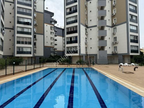  GÜZELOBA'DA HAVUZLU SİTEDE KATTA 1+1 SATILIK DAİRE 