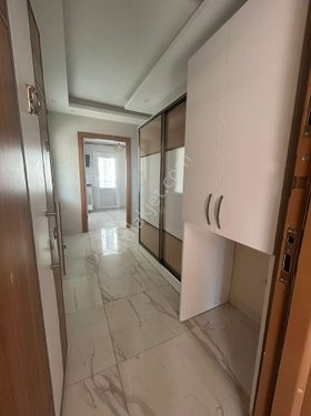 1+1 ÇİFT BANYOLU 65 m2GENİŞ OTURUMLU ÇİFT BALKONLU İSKANLI SATILIK DAİRE