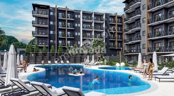 EGE MAHALLESİ'NDE ULTRA LÜKS KISMİ DENİZ MANZARALI 1+1 DAİRE