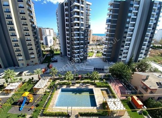 *TURUNCUDAN* ARPAÇBAHŞİŞTE FULL EŞYALI HAVUZLU 1+1 KİRALIK DAİRE